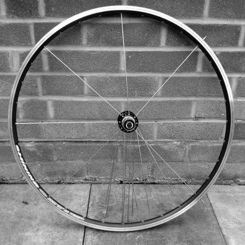 Gear side outer spokes laced